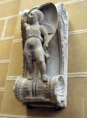 winged cherub standing on scroll design architectural decoration Stefano Bardini Museum in Florence, Italy