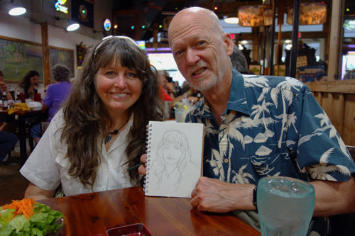 April 28 SculptFest: Herb Long sketched Kelly as we waited for the Post-show Packout Dinner to Arrive.