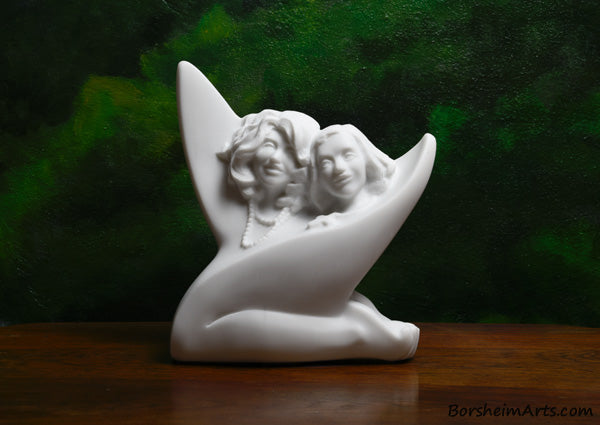 Sisters, a commission stone carving portrait sculpture in white marble from Carrara, Italy