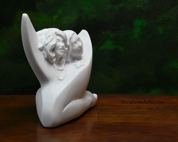 3/4 view Sisters, a commission stone carving portrait sculpture in white marble from Carrara, Italy