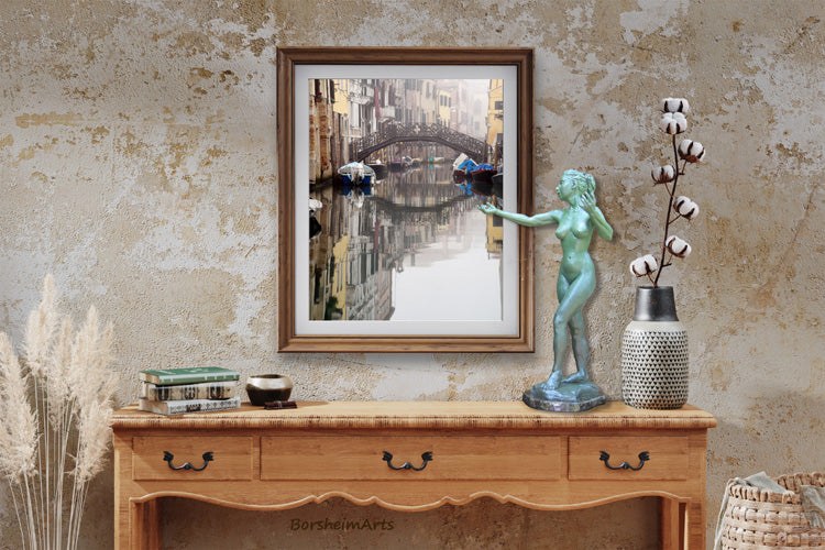 Sirenetta, aka The Little Mermaid, with a green patina on bronze seems to present this lovely image of Venezia, in northern Italy.