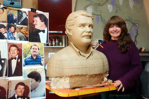Artist Kelly Borsheim stands near her almost completed portrait bust of Uncle Stuart, a late Texan
