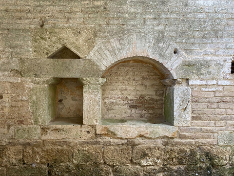 architectural detail perhaps burial window inside the Abbey of San Galgano, Chiusdino, Siena, Tuscany, roofless church