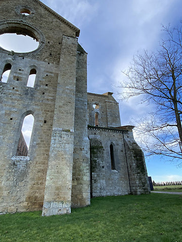south side view of the Gothic architecture of the Abbey of San Galgano, Chiusdino, Siena, Tuscany, roofless church