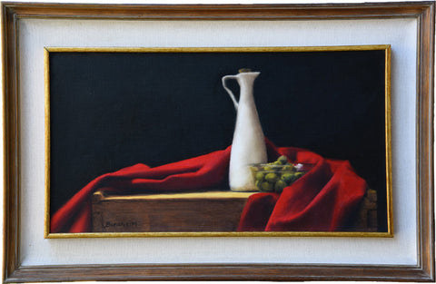 red white and green oil painting framed of red cloth, green olives, and a Tuscan white ceramic oil vase.