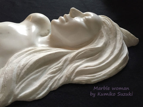 marble portrait sculpture of a woman with long flowing hair by artist Kumiko Suzuki on BorsheimArts