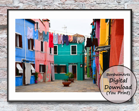 laundry hangs among colorful buildings on the island of Burano near Venice, Italy available as a digital download fine art