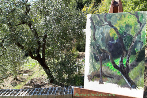 adding dark tones to the trunk of the olive tree to build contrast and interest in the acrylic painting by Kelly Borsheim