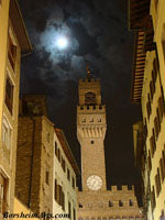 The Palazzo Vecchio in Florence, Italy, under a full moon