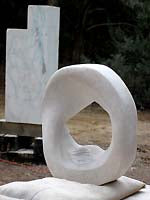 Stone Carving with Marble Block for Gymnast in Background