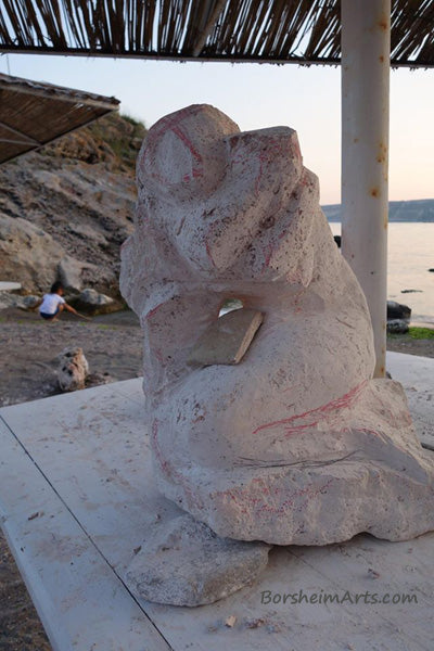 See Crayon marks on the stone for the Mermaid design while carving WIP