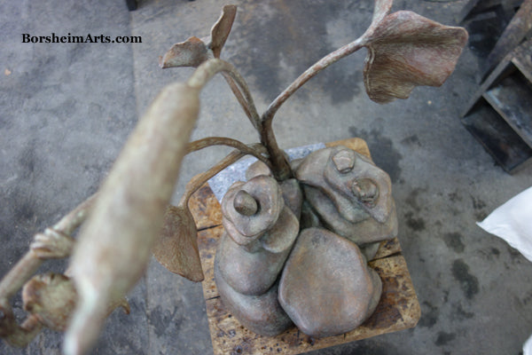 Aerial View Bird's Eye of bronze garden sculpture Rock Towers and Frogs