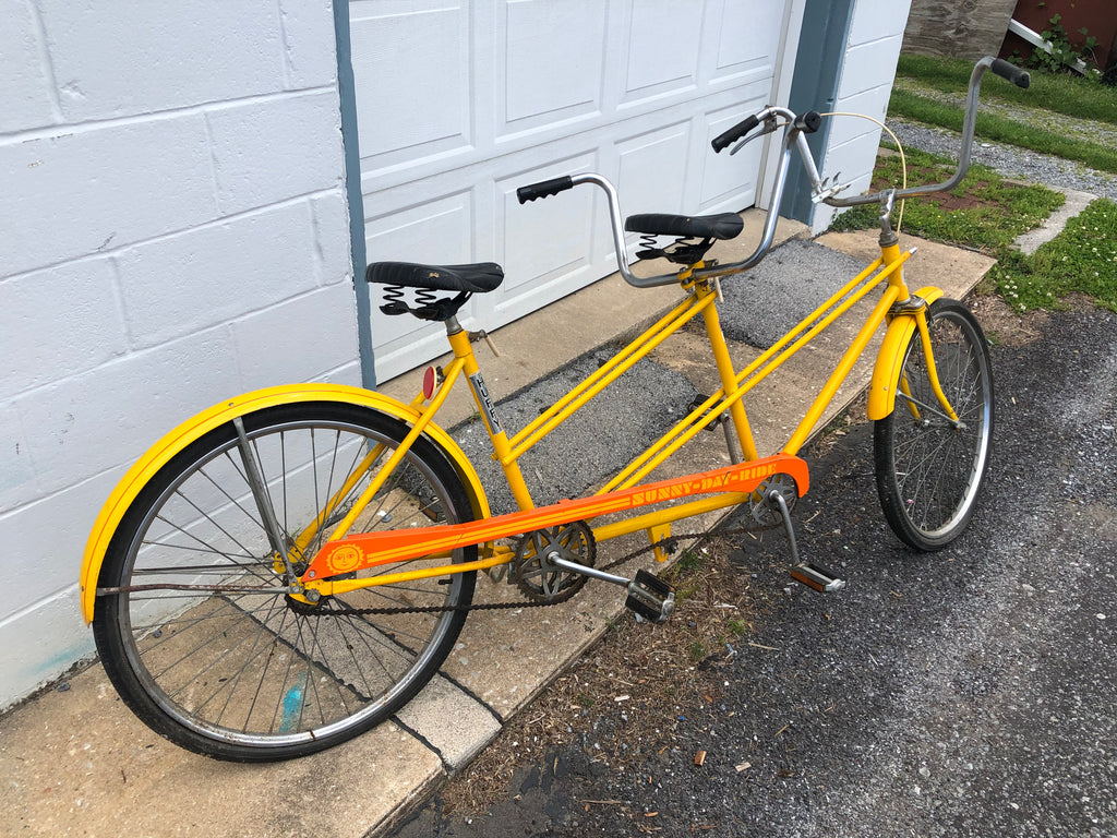 yellow tandem bike