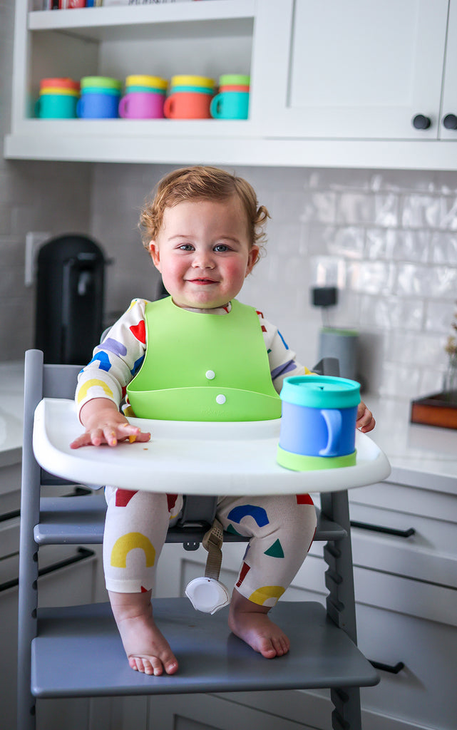 Norris_Frederick_happy baby in high chair