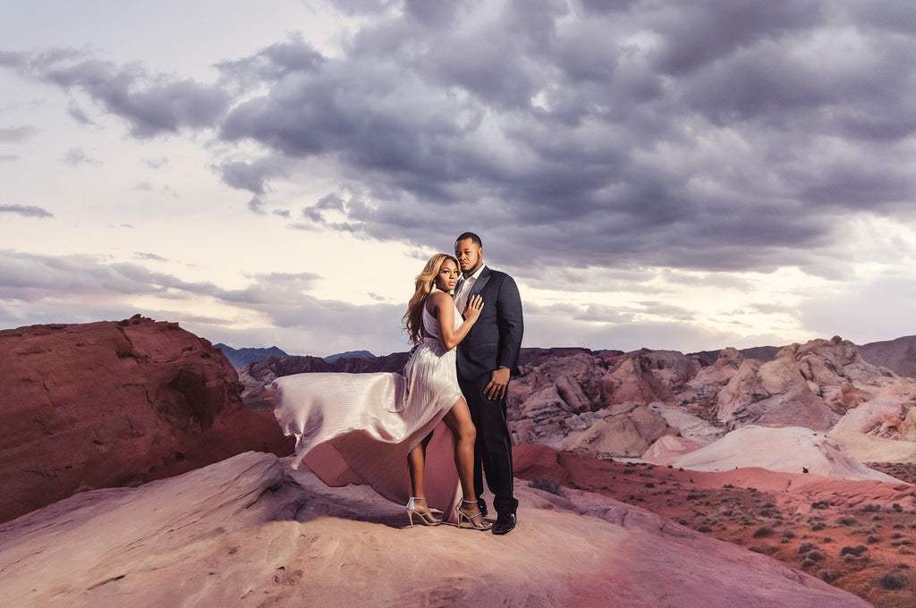 Andre Brown Photography Black Husband and wife on red rocks 