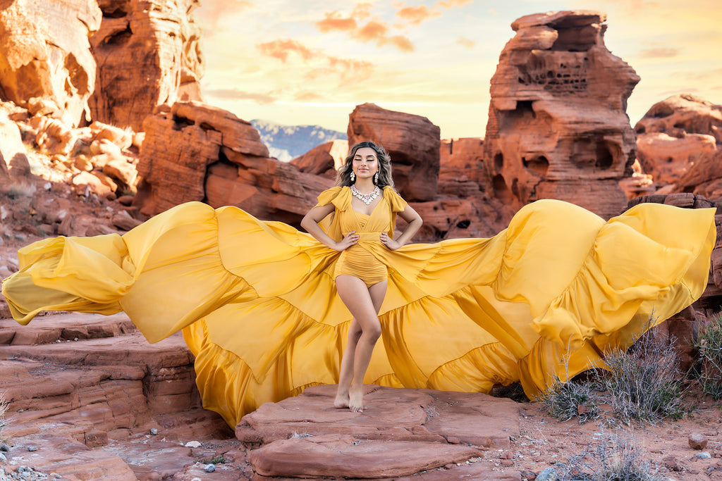 Ric_Lewis_woman in yellow dress in desert