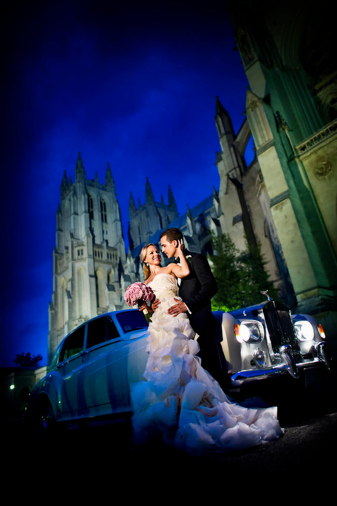 Greg Gibson bride and groom at night with Rolls Royce and National Cathedral