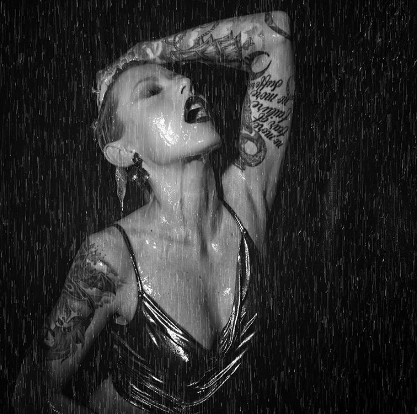 Matthew Jordan Smith woman model in rain with tattoos black and white