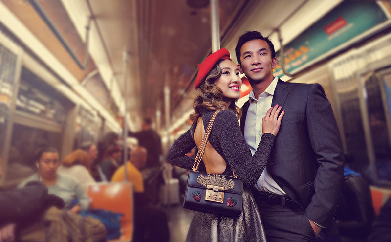 Scott Robert Lim Asian couple on subway train red beret suit