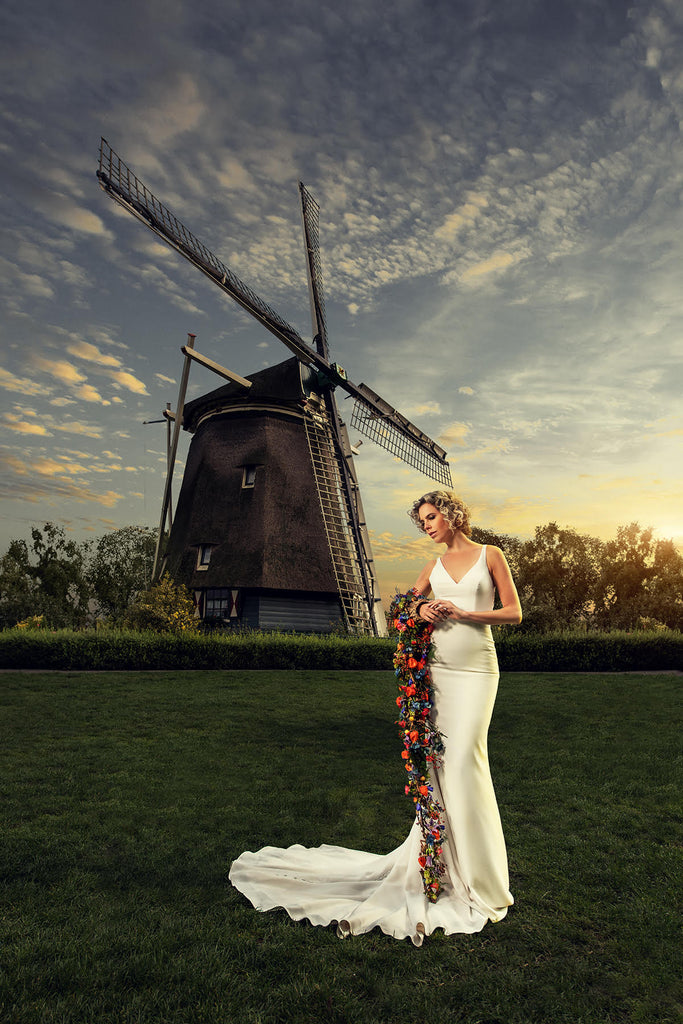 Yuliya Panchenko bride at windmill sunset