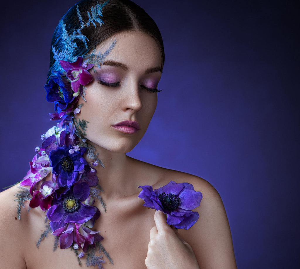 Yuliya Panchenko model with purple flowers pink purple eyeshadow