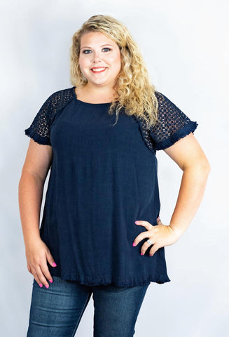 Frayed Hem Linen Tunic Top with Floral Crochet Sleeves in Plus Size by Umgee Clothing