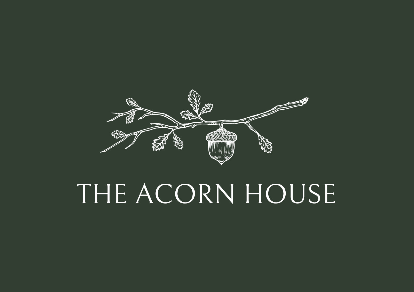 the acorn house logo on green background