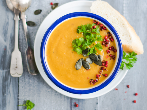 Pumpkin seeds garnishing a soup