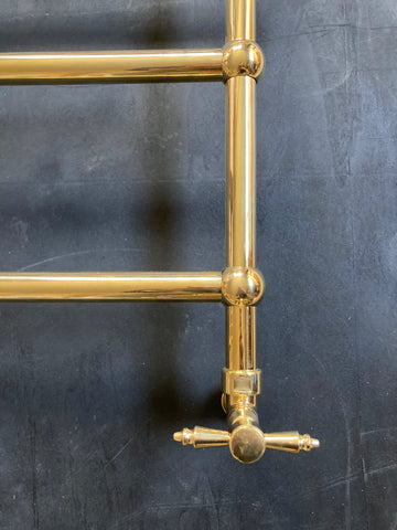 Brass heated towel rail