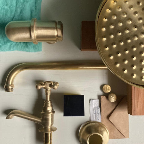 Unlaquered satin brass tapware and shower