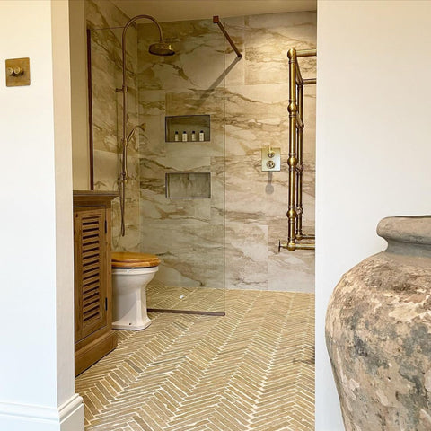 Heated towel rail in practical airbnb style bathroom
