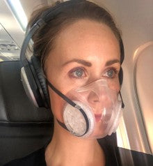 Woman on Plane wearing a Bubl Face Mask