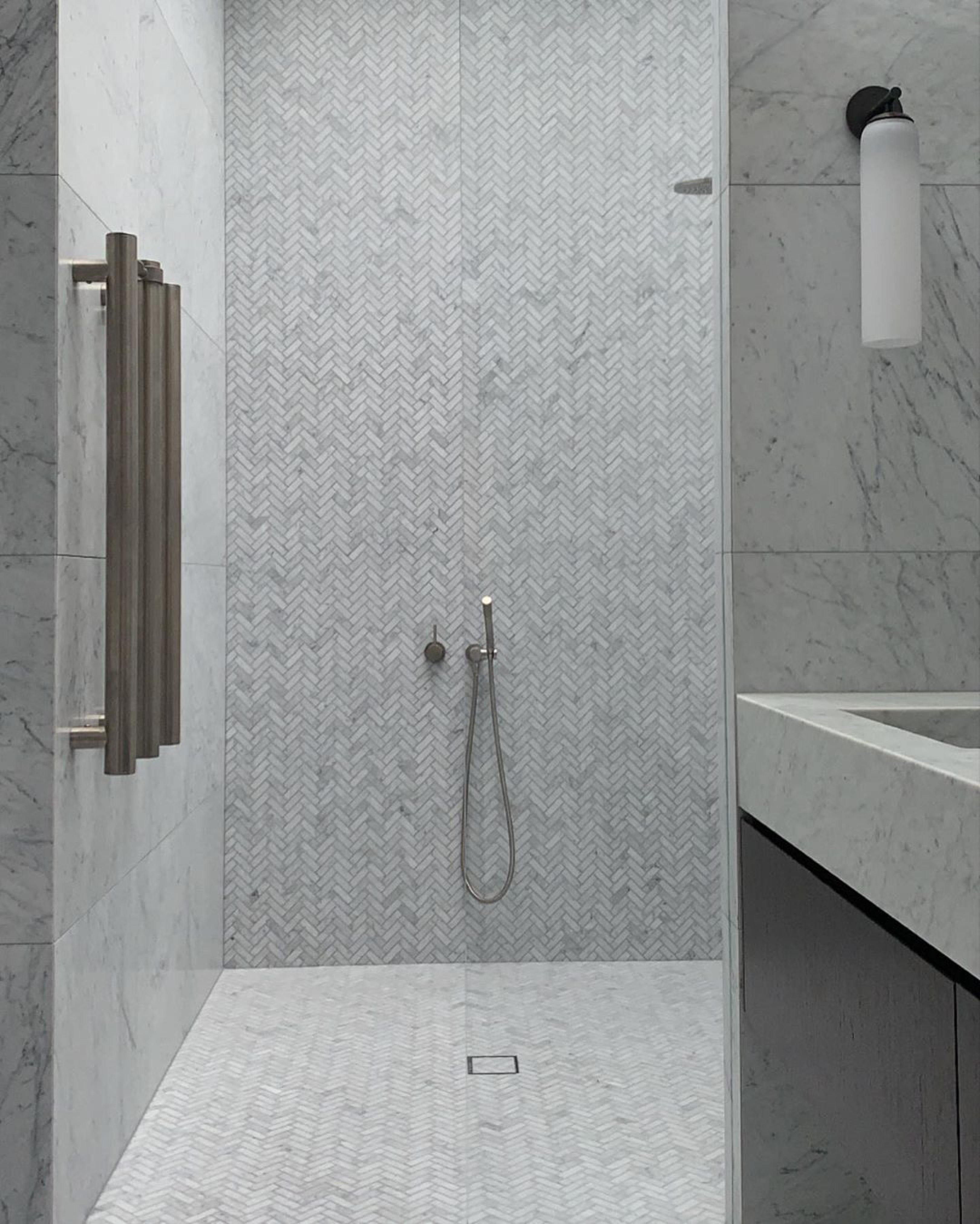 herringbone tile bathroom