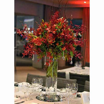 Red James Storey orchids lilies table tall centerpiece