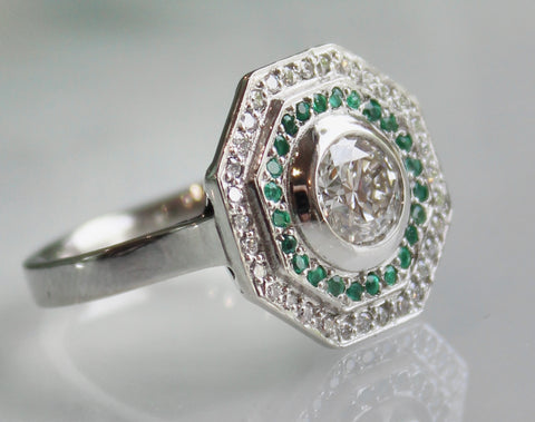 Platinum, diamond & emerald engagement ring