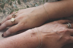 layered permanent welded bracelets white gold