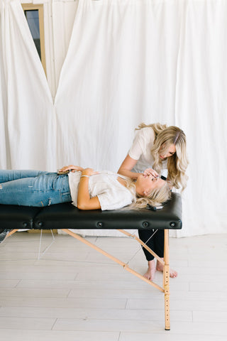 Stylist performing a brow lamination on her client | LashLift Store