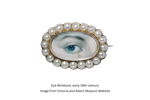 miniature eye pearl brooch