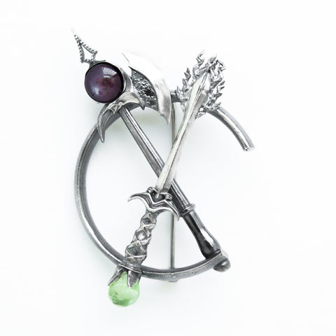 Cutting Through Brooch. Sterling silver, star ruby, peridot