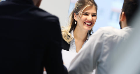 woman wearing gold jewelry during a job interview