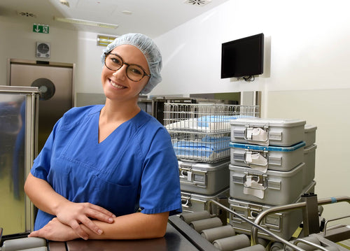 Laboratory Worker Smiling with Approval