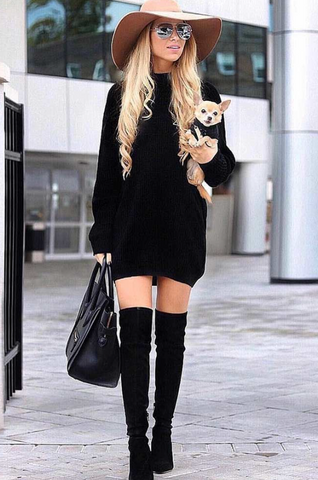 Women in turtleneck dress, and over-the-knee boots