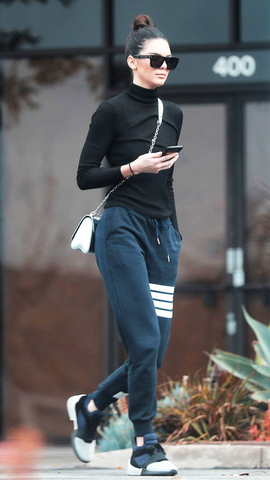 Kendall Jenner in black turtleneck and joggers