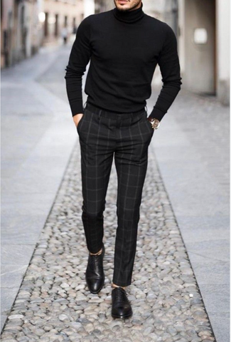 man in turtleneck tucked into tailored trousers monochromatic outfit