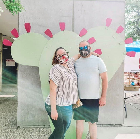 Festival goers at our drive-thru market, in front of our giant prickly pear cactus