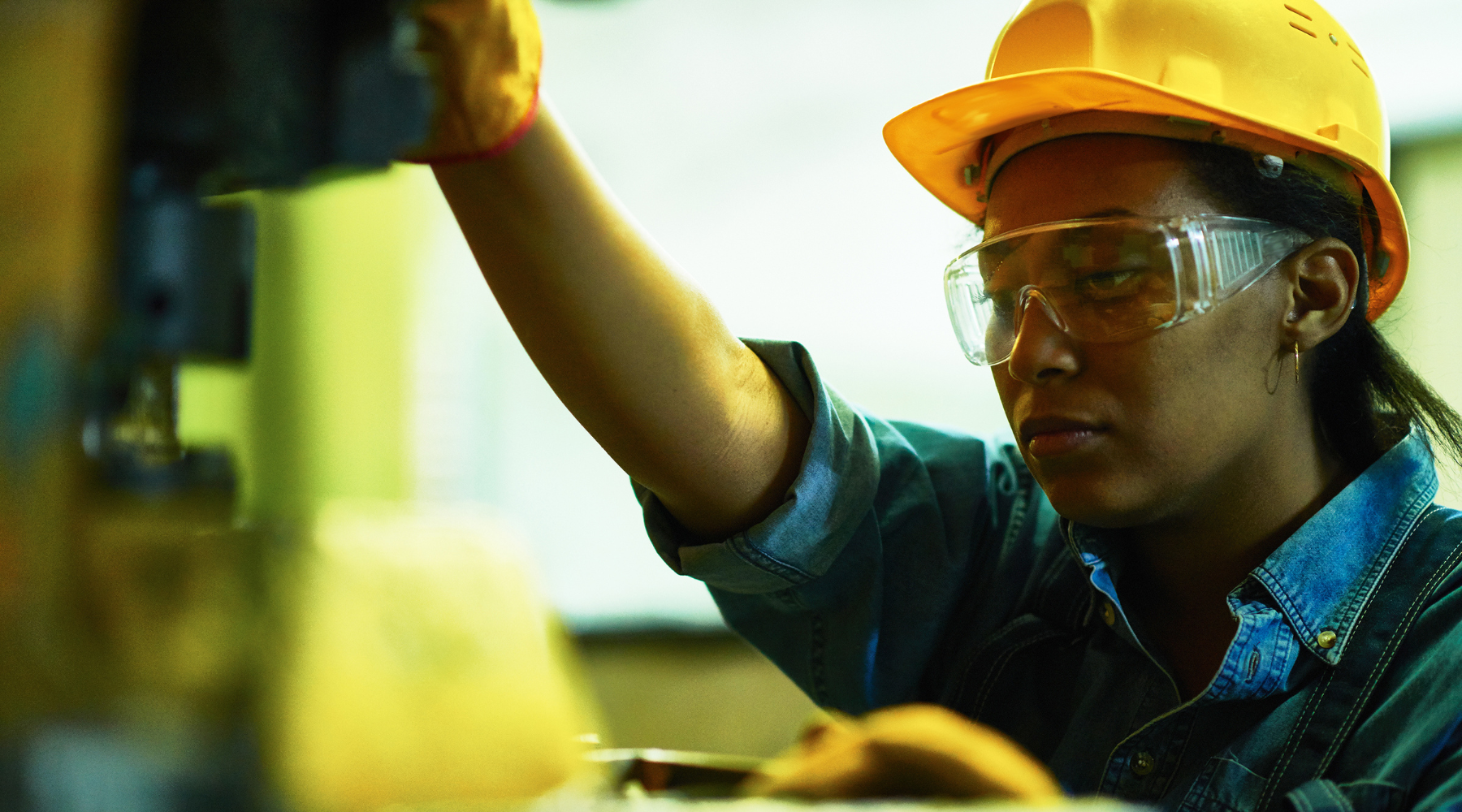 industrial worker wearing safety glasses