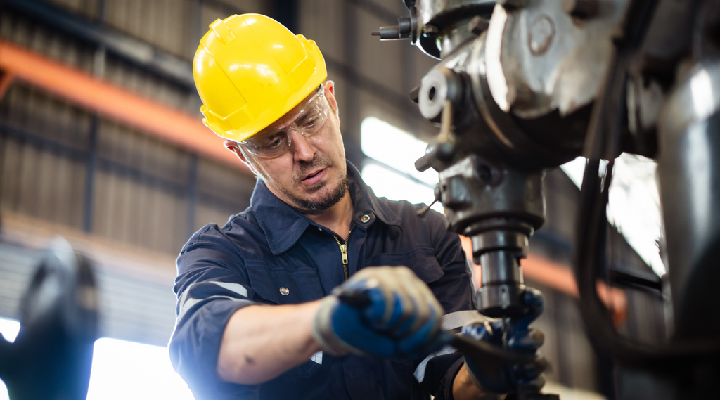 technician conducting preventive maintenance