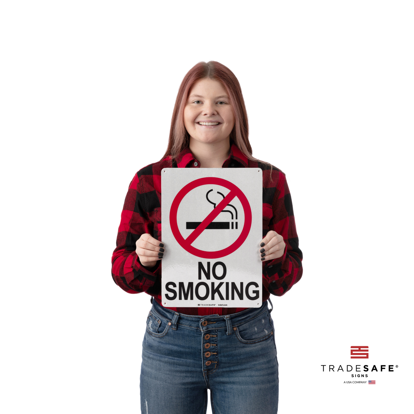 a person holding the no smoking sign