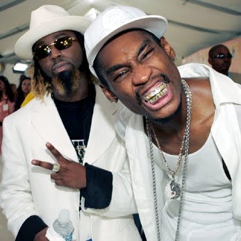 rappers wearing bling bling grillz