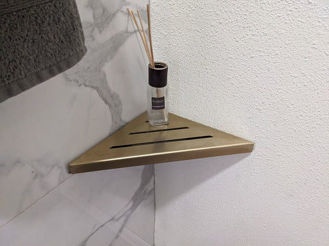 https://cdn.shopify.com/s/files/1/0404/1198/8125/products/WallMountedSatinGold9ShowerShelf_large.jpg?v=1662844729